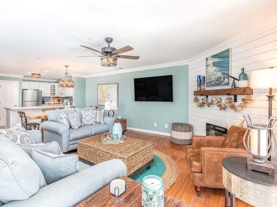 The living area with Smart TV and sleeper sofa
