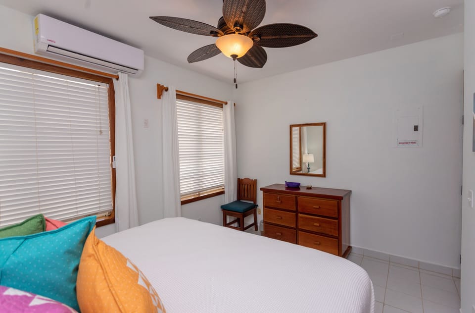 Coral Bay Villas - Bedroom with King Bed