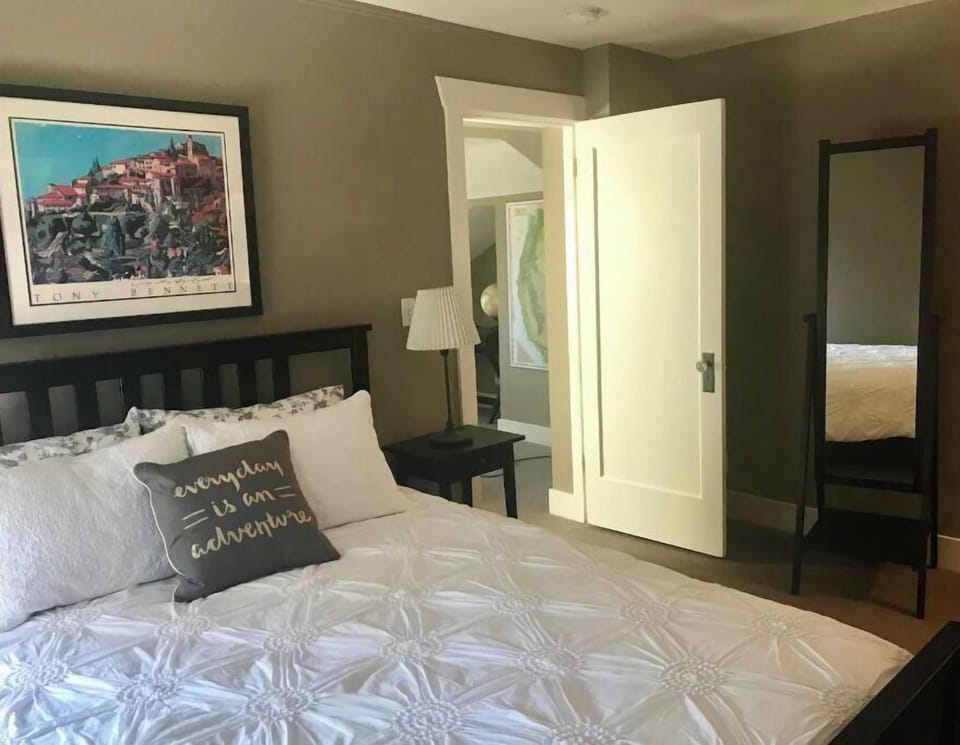 Queen size bed, wardrobe mirror, 2 sunny windows, with blackout shades.