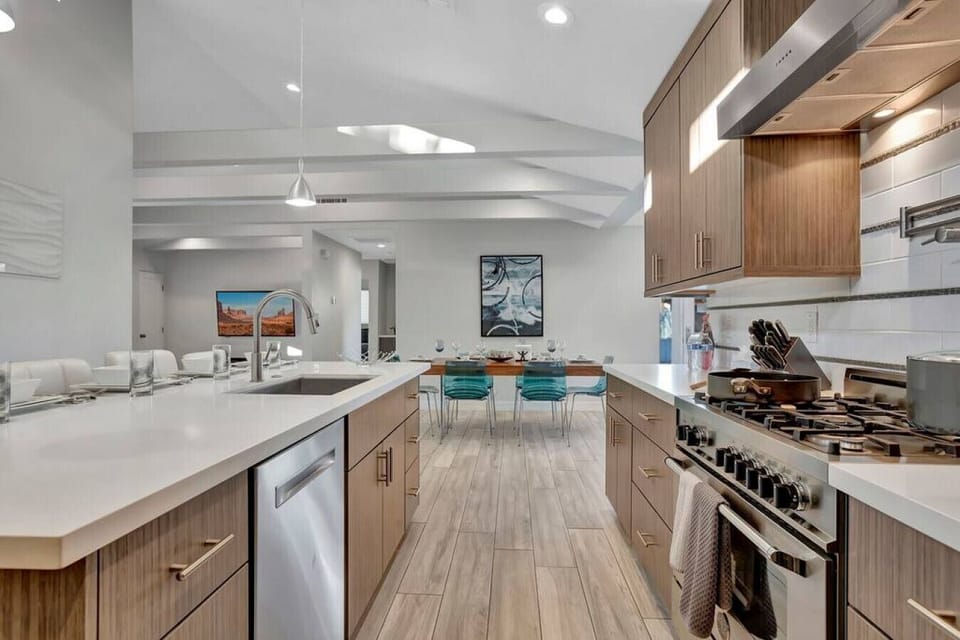 Spacious kitchen with a stainless stove