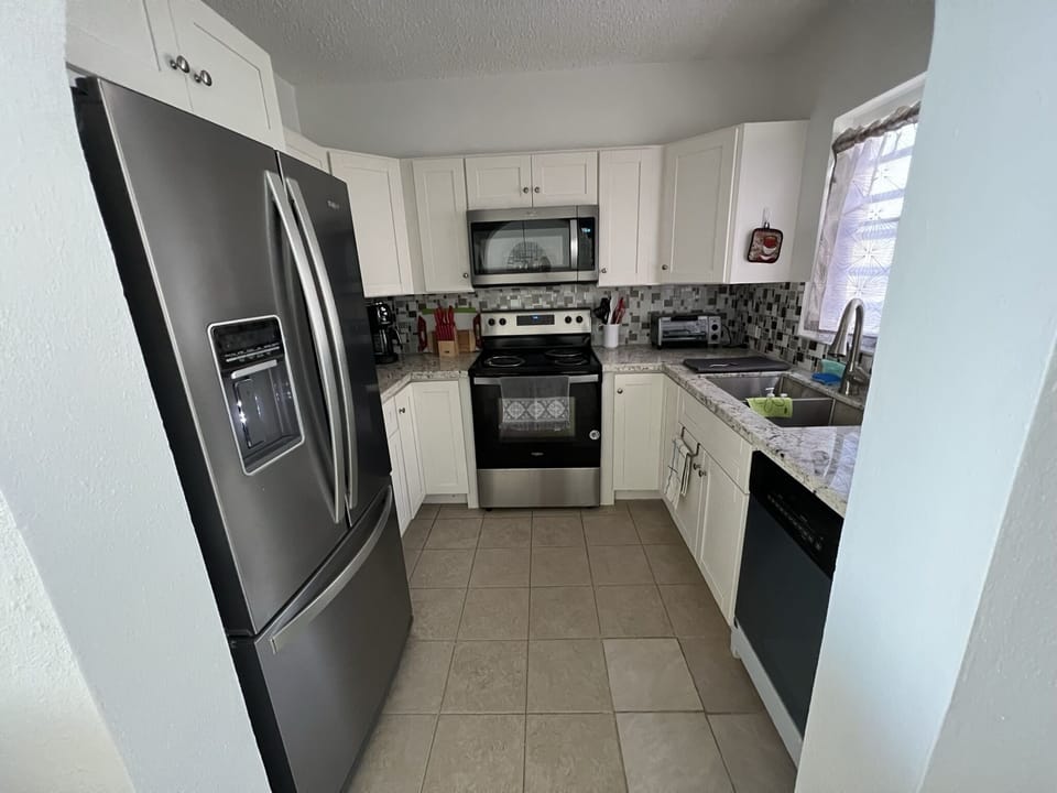 Well stocked kitchen with all your needs provided for