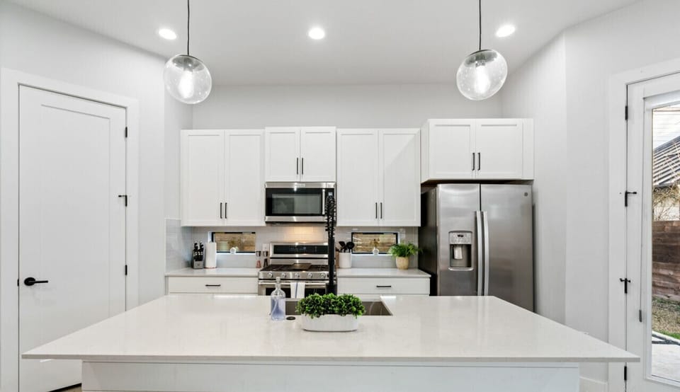 Fully equipped kitchen with all the essentials, dishwasher, and pantry