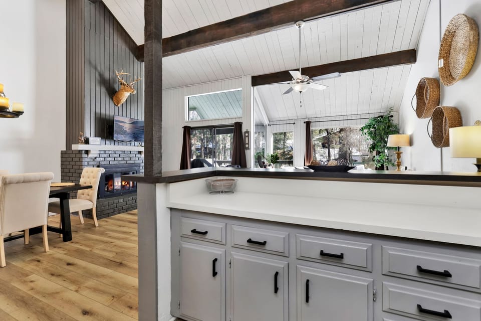 Open kitchen with island perfect for gathering, connected to the dining area

Kitchen island at the heart of the home, opening into the dining space
Easy flow from kitchen island to dining area—ideal for entertaining