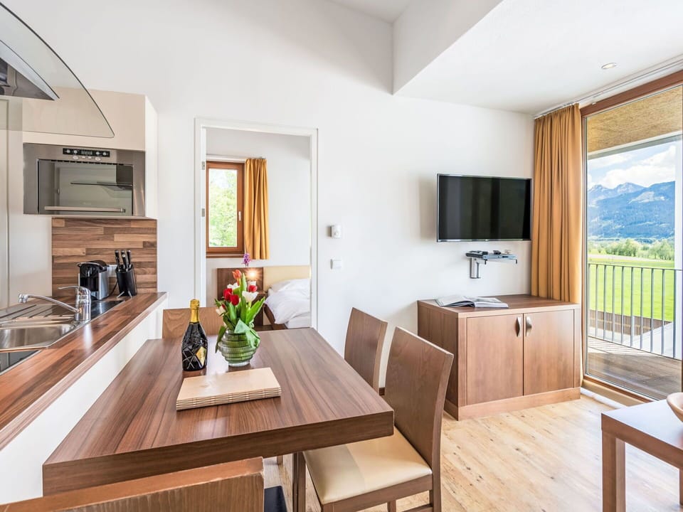 Property, Table, Furniture, Cabinetry, Wood, Plant, Interior Design, Window, Building, Flooring