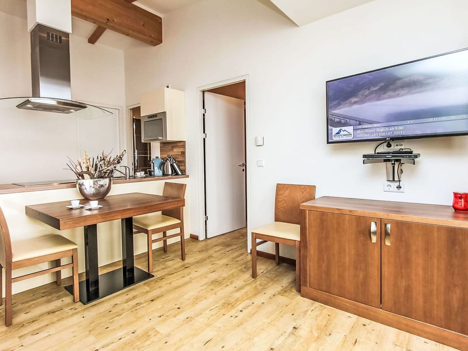 Table, Furniture, Property, Picture Frame, Cabinetry, Interior Design, Wood, Architecture, Lighting, Television