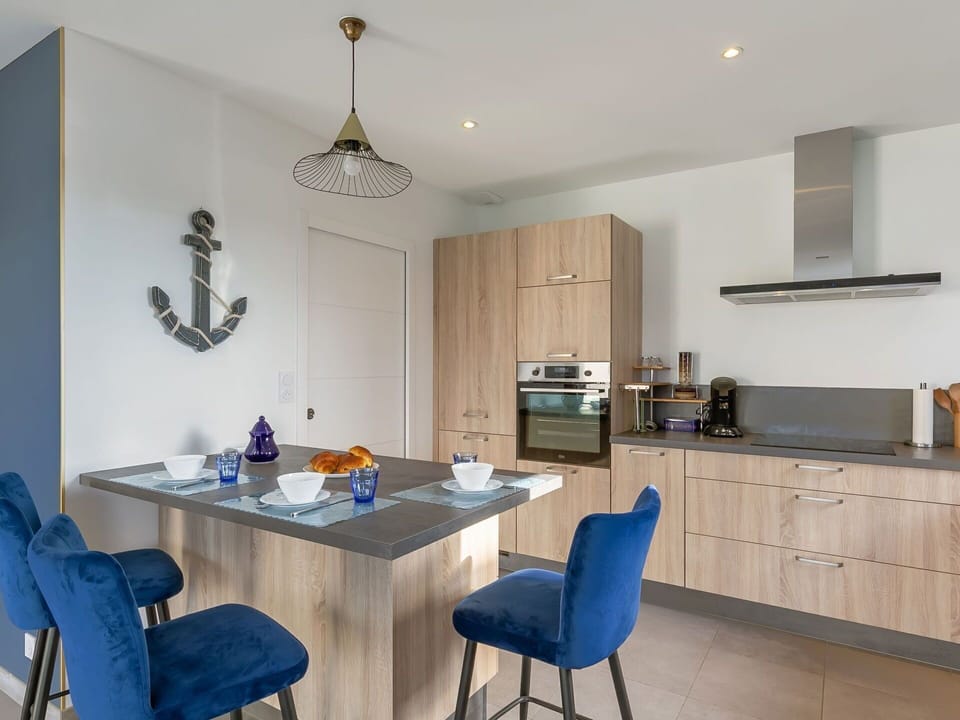 Furniture, Cabinetry, Property, Table, Countertop, Blue, Chair, Lighting, Interior Design, Wood