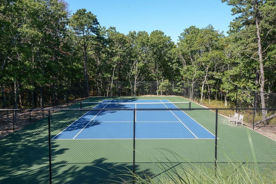 private tennis court, decoturf