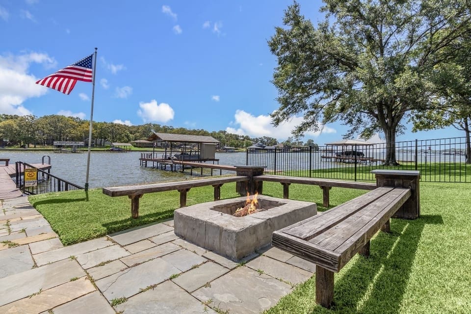 Fire pit and seating by the water for those cool nights.