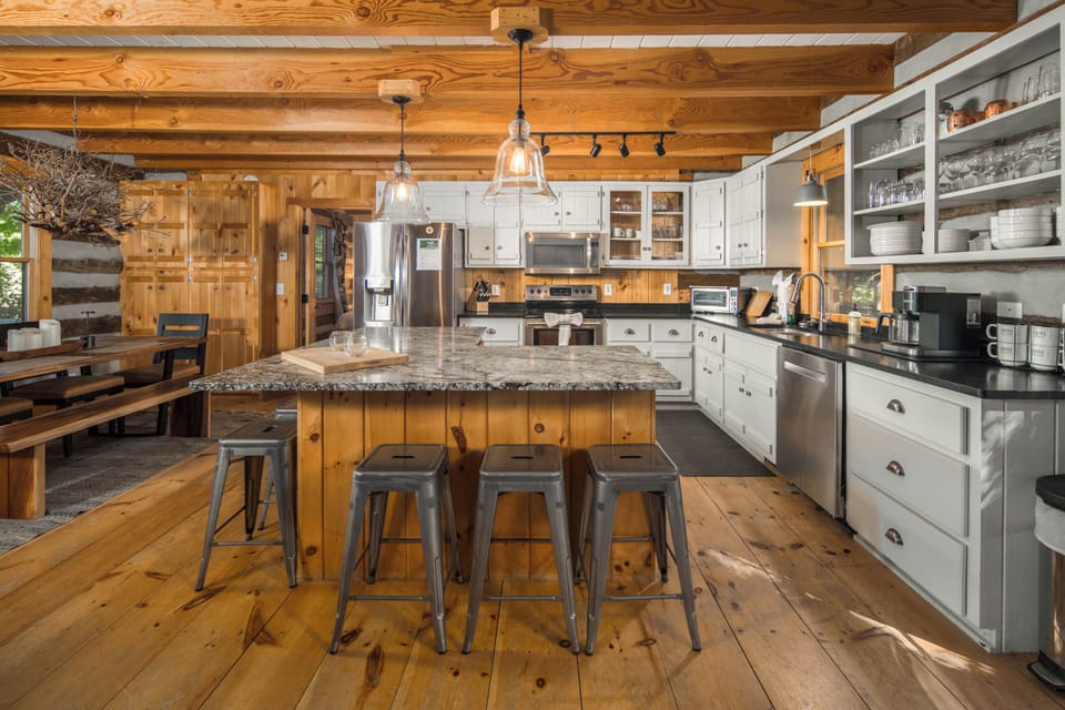 Enjoy cooking and gathering together in the spacious kitchen with generous prep space and seating for family and friends