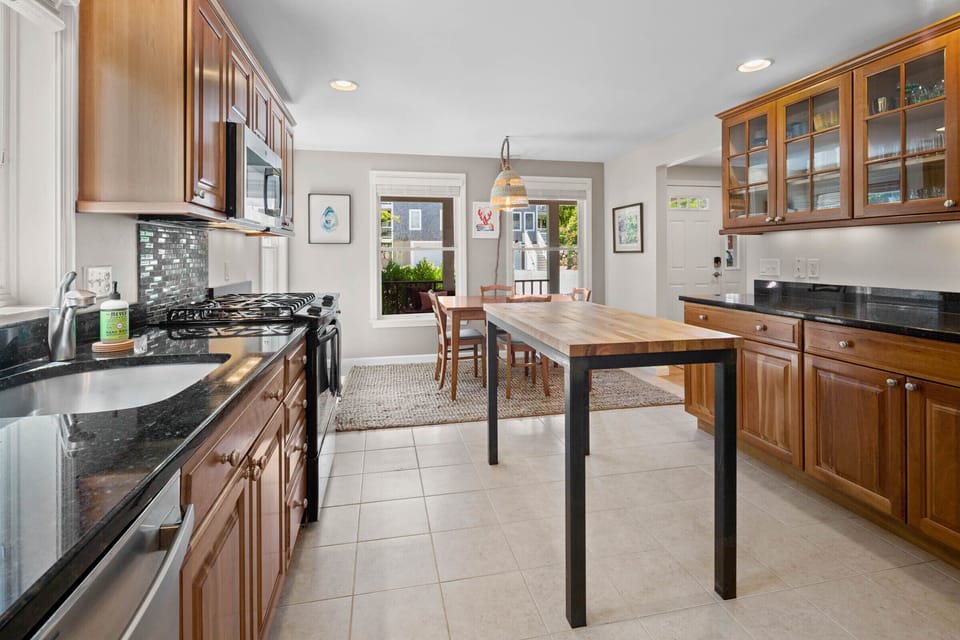 Kitchen (1st floor). Coffee maker, toaster, microwave, and dishwasher. 