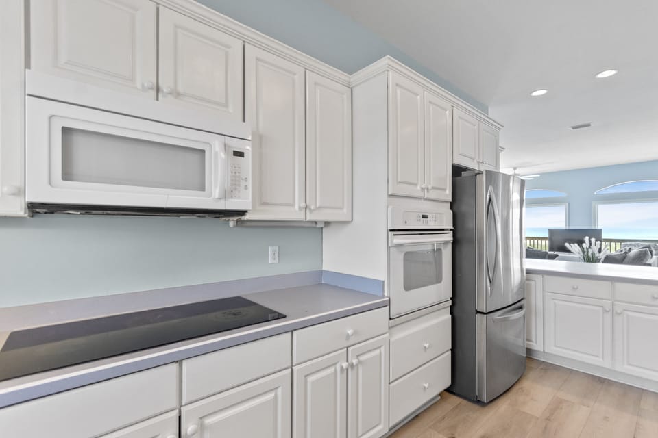 Plenty of cabinetry and a large pantry to store your "stuff"