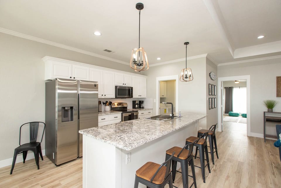 Open concept kitchen and dining for all your vacation meals!