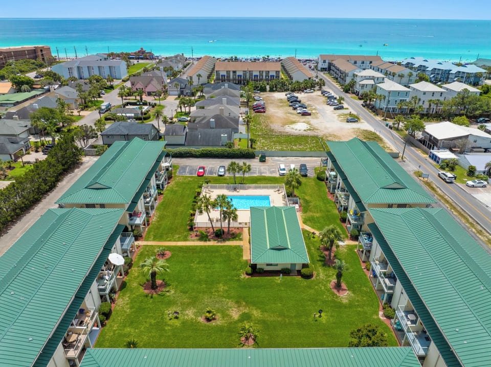Large community pool and lush grounds