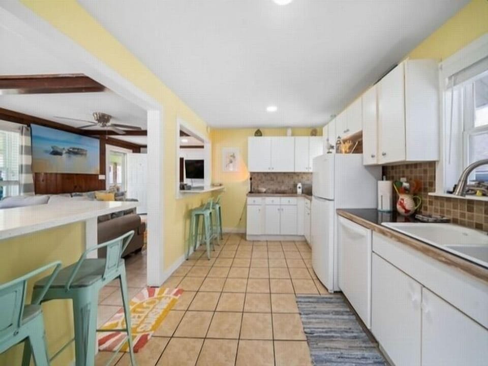 Flooring, Indoors, Room, Kitchen, Refrigerator