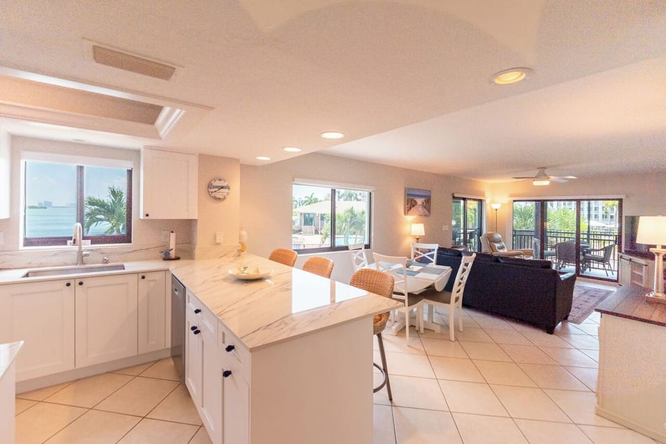 The FABULOUS Harbour Pointe 121 vacation condo features an open concept living area with beautiful views from every window    