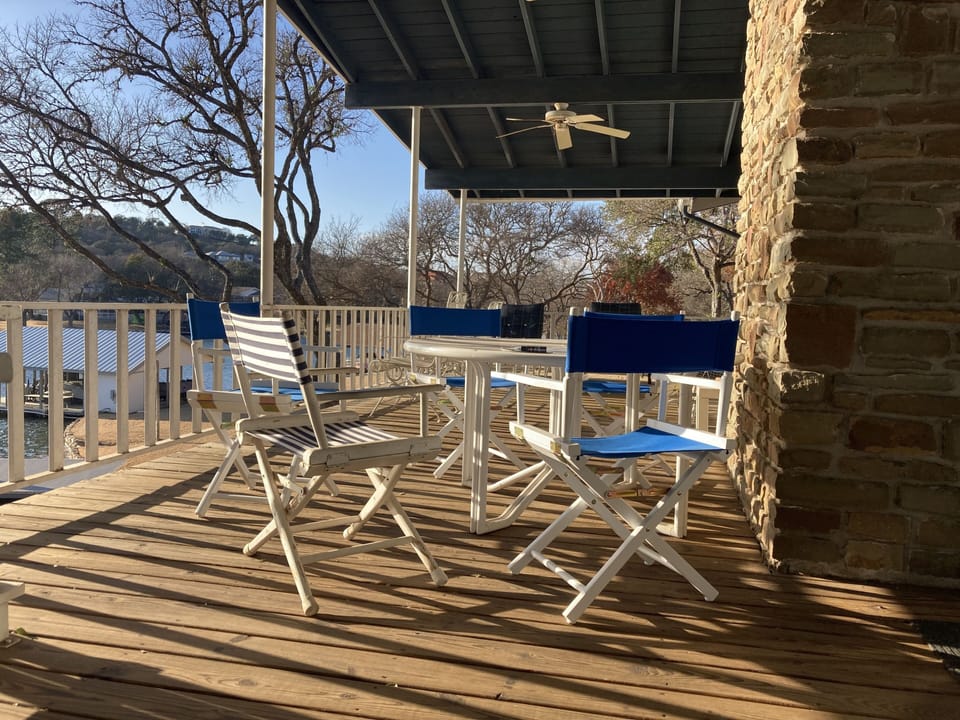 Deck with large round table, seats 8, more chairs 