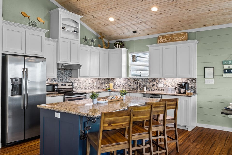 Bright, clean, and stocked—this kitchen is made for easy vacation meals.