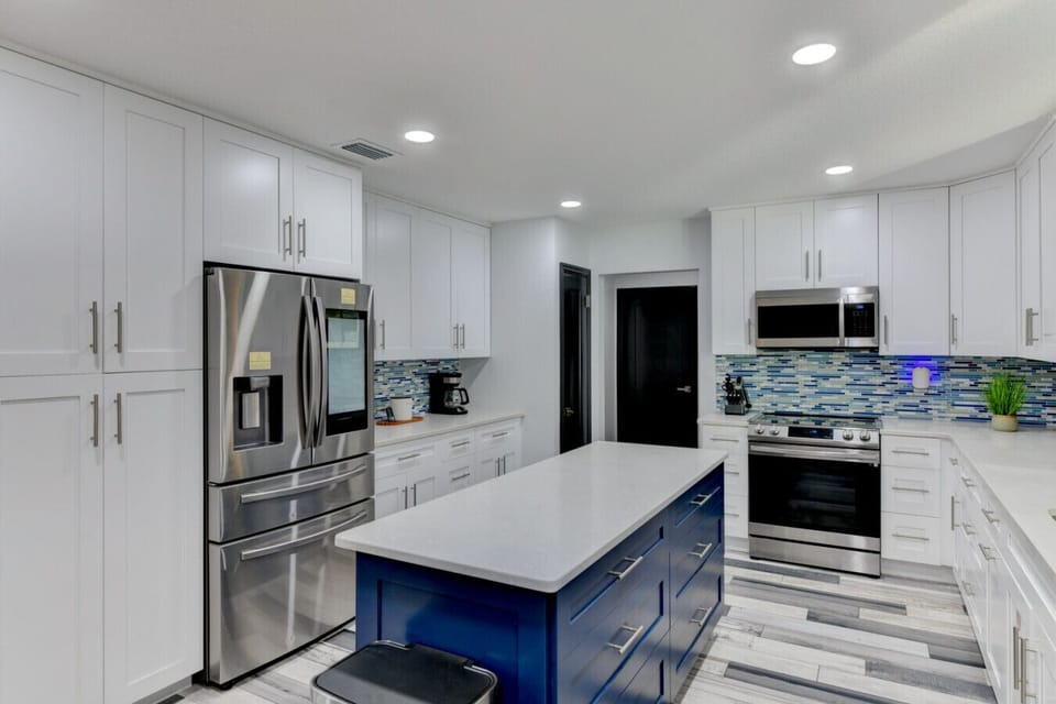 YouTube music on the smart refrigerator while cooking for the family. Enough pots, pans, and cooking utensils for a Thanks Giving Dinner!