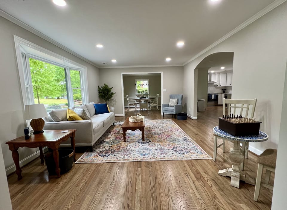 Enjoy a game of chess while visiting with friends and family in the living room.
