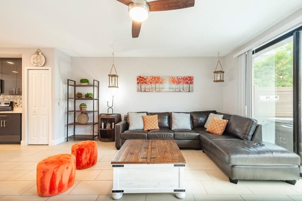 Open living space that seamlessly connects the beautiful kitchen and dining area, offering a perfect blend of comfort and style.