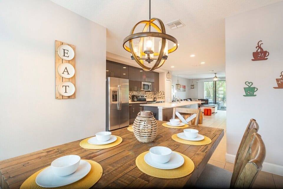 An warm style dining area is perfect for quality time with your loved ones, while you prepare the most delicious plate at out equipped kitchen.
