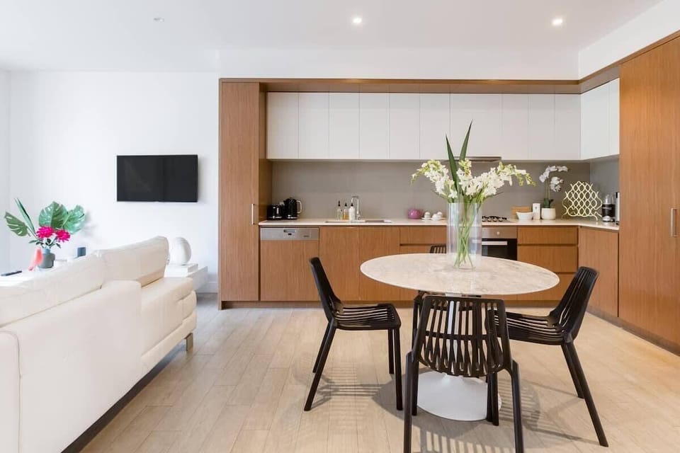 Open plan living/dining/kitchen which flows onto large balcony