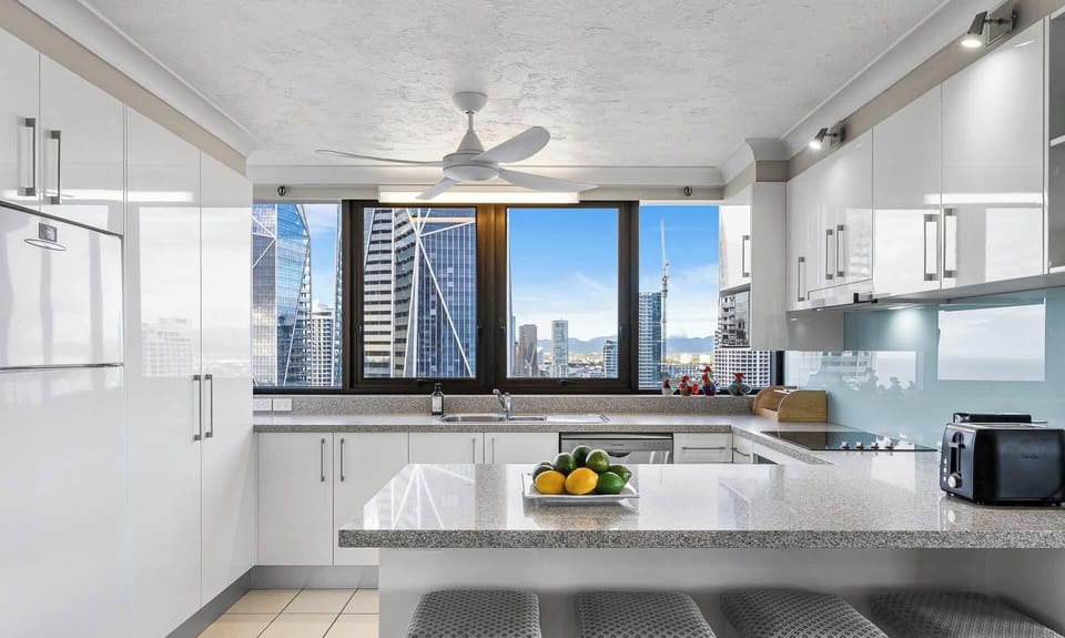 Granite benchtops in kitchen make the ideal breakfast bar