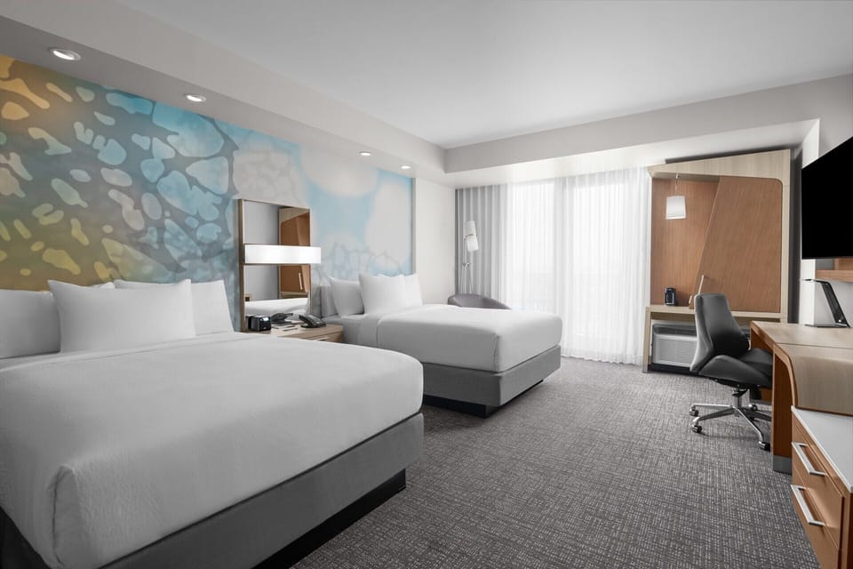 Stretch out with two cloud-soft beds and bright natural light