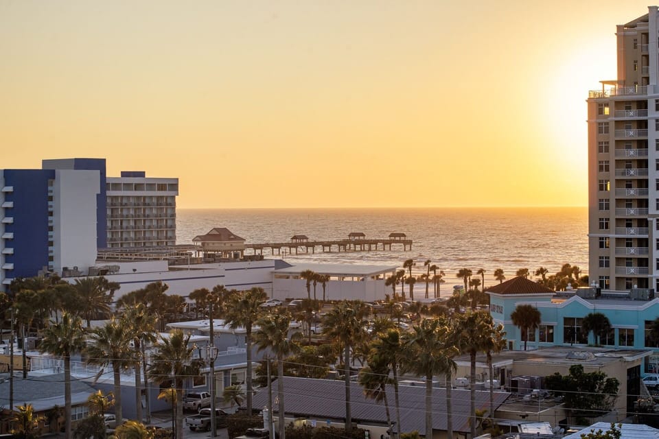Savor golden-hour sunsets over the coast and city lights.