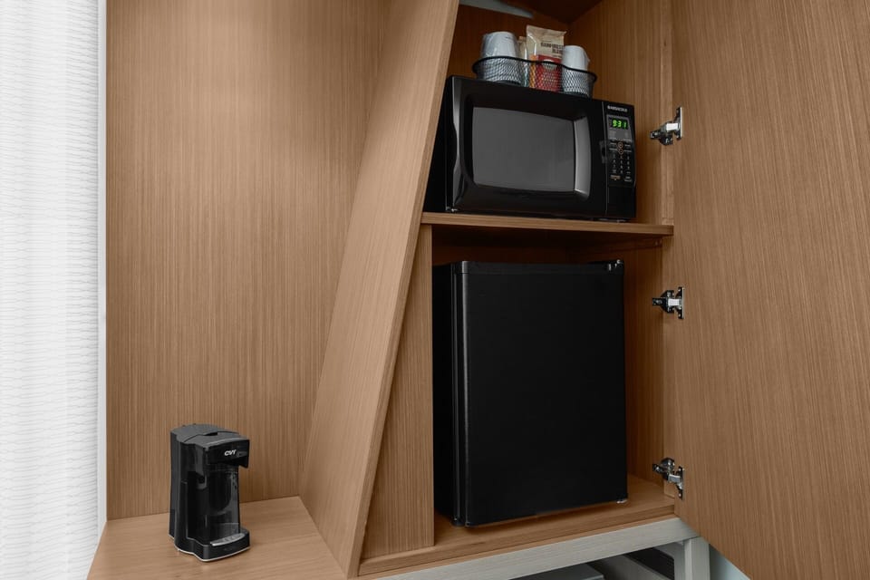 Refresh with in-room coffee, mini fridge, and microwave convenience.