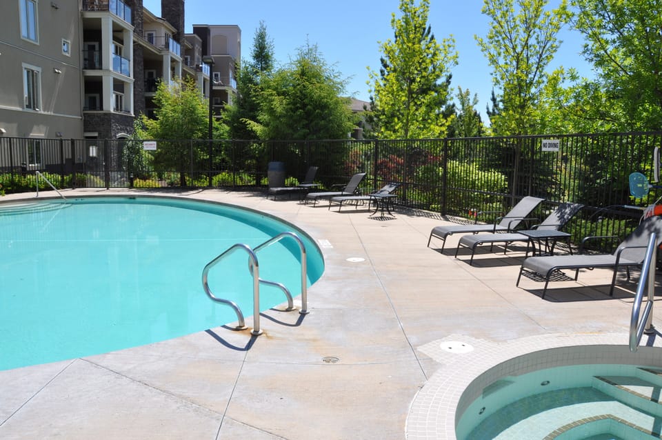 Heated pool and hot tub with lots of seating