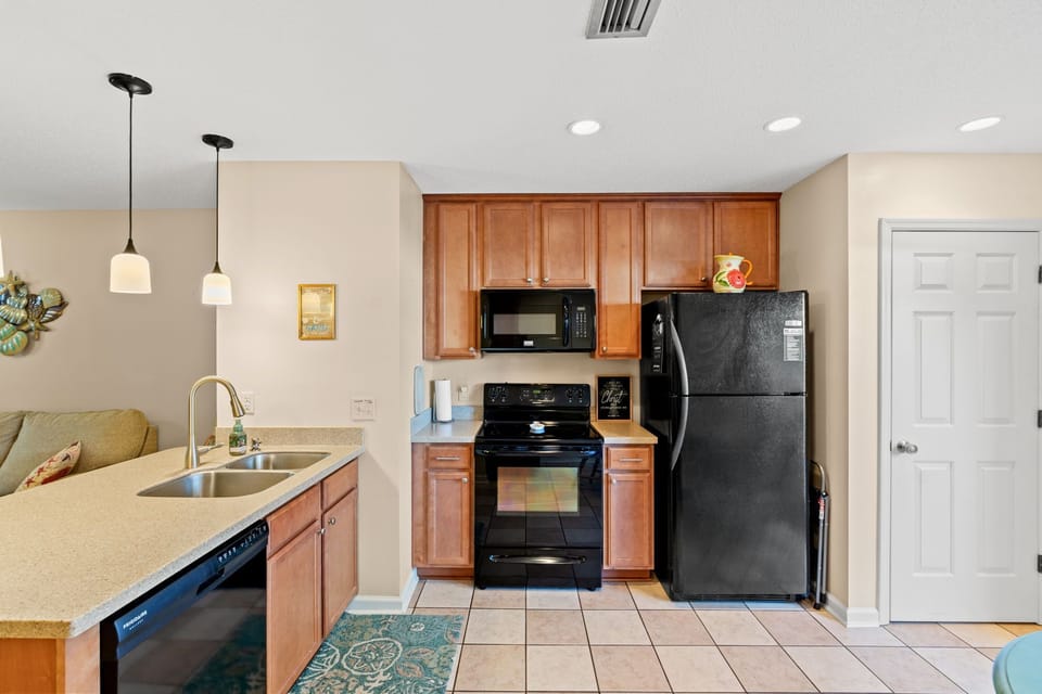 Modern kitchen with appliances and ample counter space for all meals.