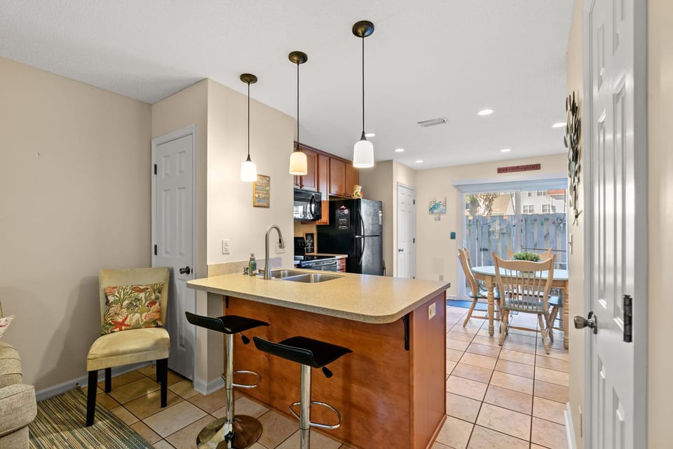 Sit at breakfast counter or work a bit.