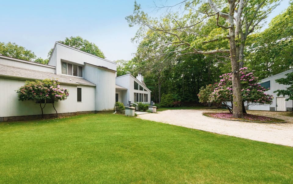 Front of house with detached garage 