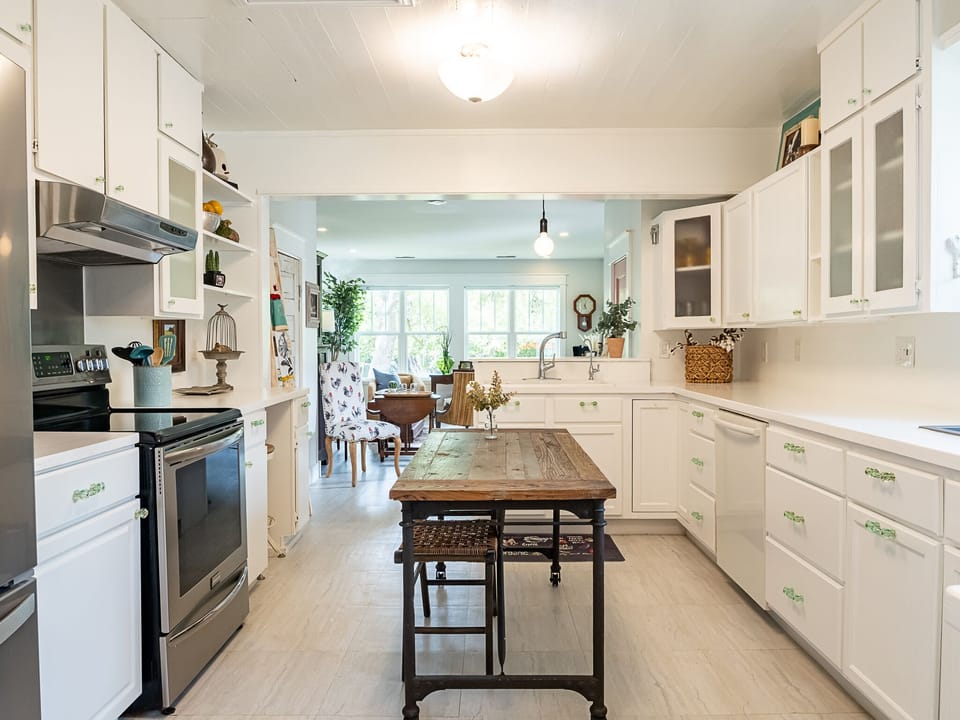 Farmhouse kitchen, island & home desk area. Includes all amenities for cooking