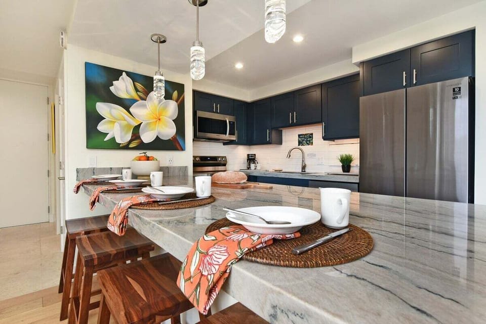 Pull up a chair! Our oversized island is the perfect spot for pancake breakfasts or planning your day's adventures.