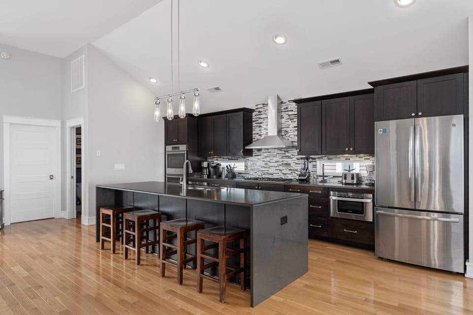 Kitchen Area with Bar Seating on Third Level