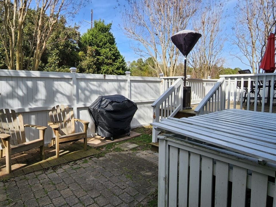 Backyard with Sitting Area and Gas Grill on First Level