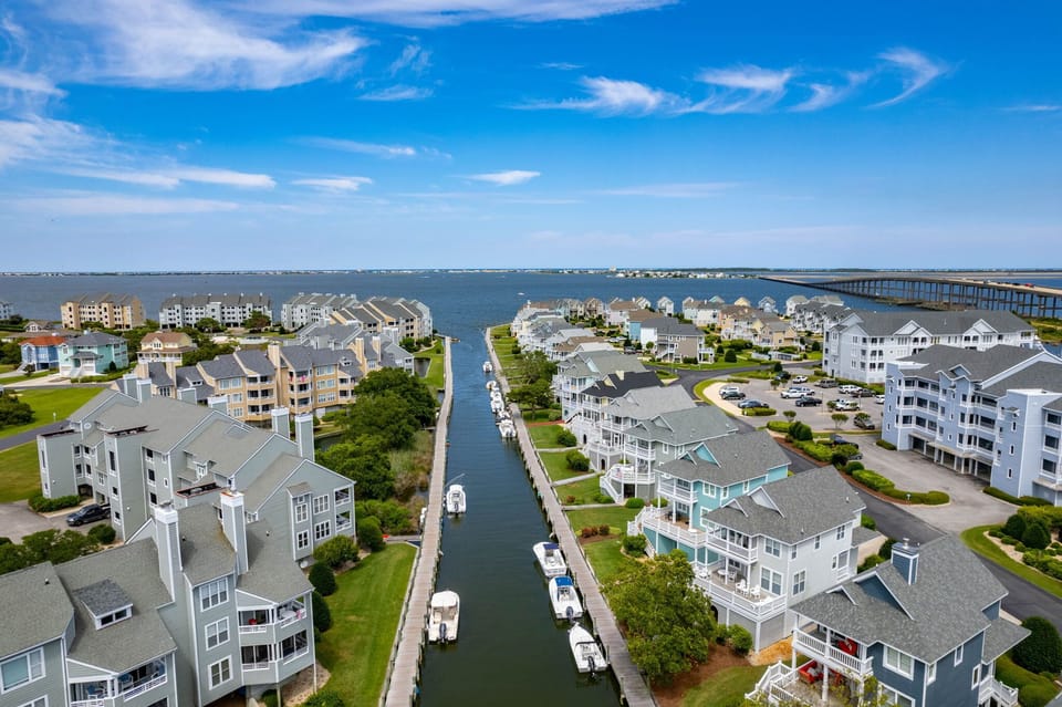 Aerial View of the Canal into the Sound in the Pirate's Cove Gated Community in Manteo