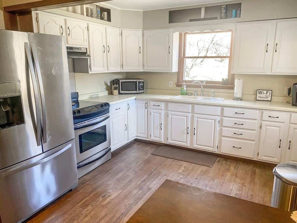 Bright, open kitchen with plenty of space to cook and lots of fridge space!