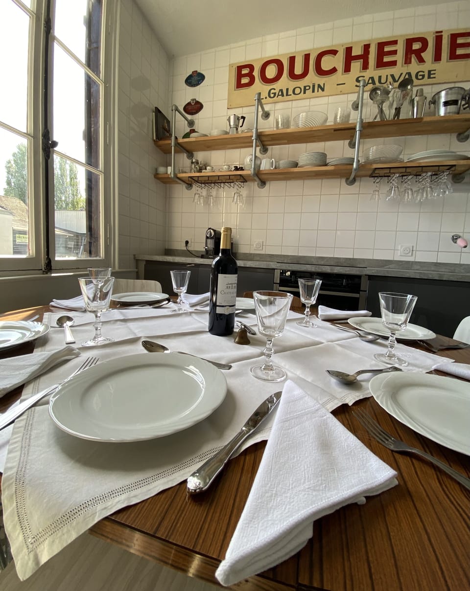 Dining for 6 with French linens and large selection of real crystal glasses