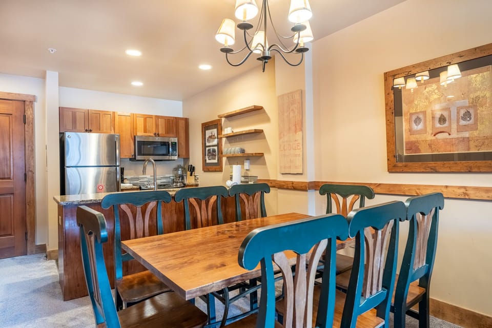 Gather around your elegant dining table for memorable meals, with a fully equipped kitchen ready for your culinary adventures.