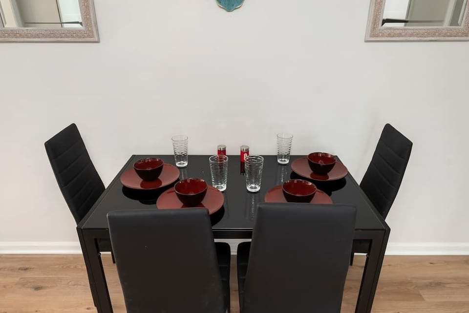 Dining for 4 people but there is enough silverware and dishes for 8 people