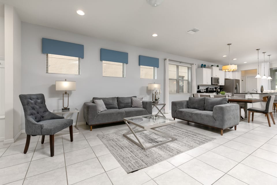 The living room opens to the dining area, creating a bright, inviting space.