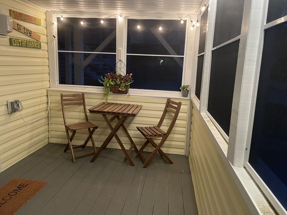 Outside screened in patio. 