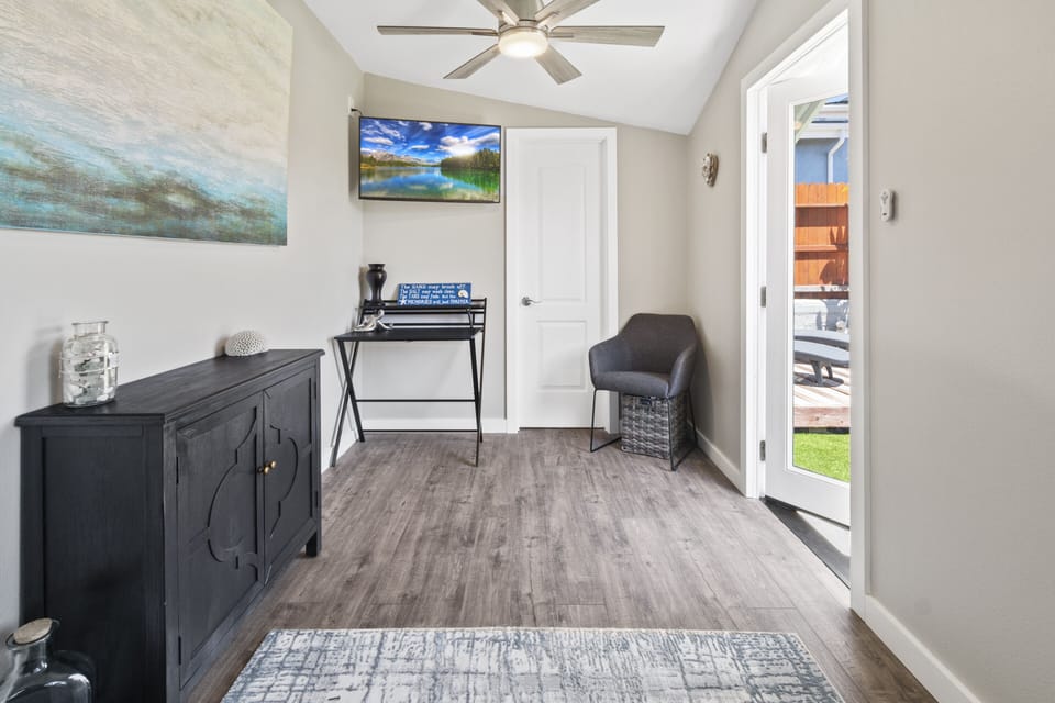 Casita interior with desk and tv. 