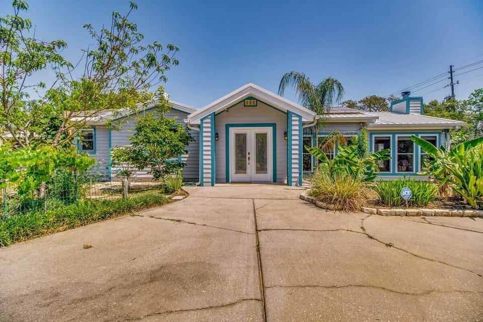 Welcome to the Raleigh Retreat! Relax in style in this spacious 5-bedroom rambler. Swim in the pool. Hang out in the game room. Do movie night the huge living room. Or take a stroll in our garden amidst the fruit trees.