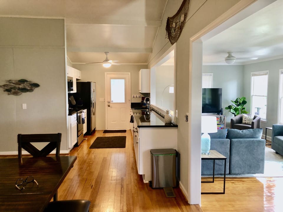 View of kitchen & living room from dining area/happy hour station.