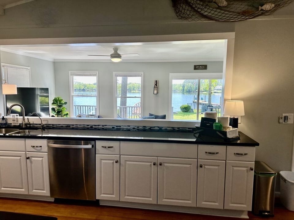 Enjoy the lake view or watch the big screen while preparing your meals!