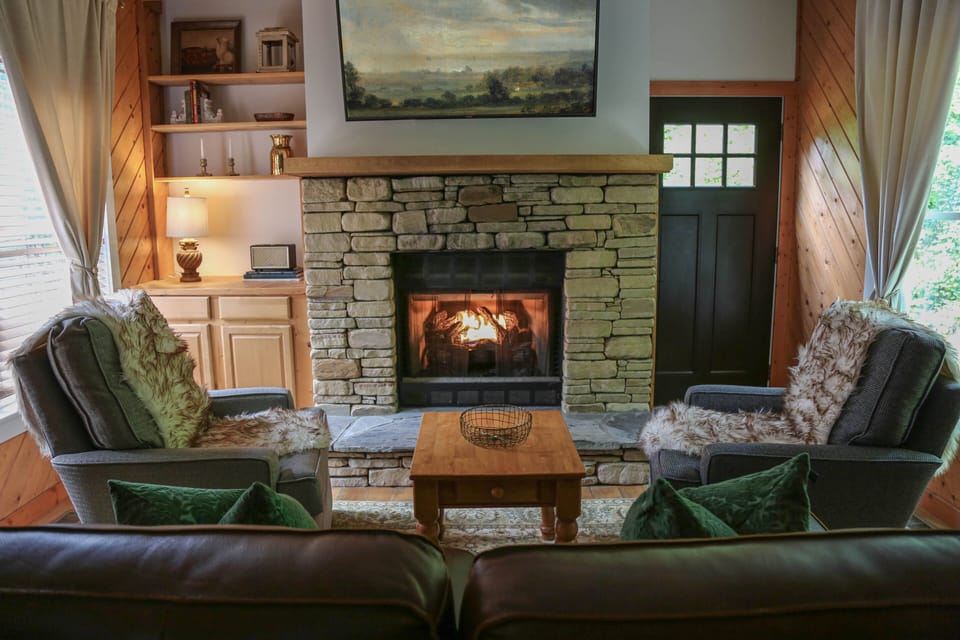 Fireplace seating area in living room 